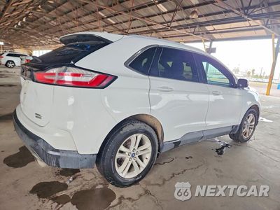 Trzecie zdjęcie samochodu z tyłu: 2020 FORD EDGE SEL VIN:2FMPK3J96LBA50262 - miniatura
