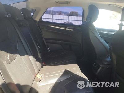 Zdjęcie 10 z 12 samochodu: 2014 FORD FUSION TITANIUM PHEV VIN:3FA6P0SU6ER142498 - miniatura
