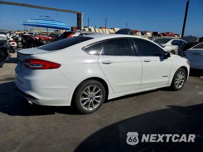 Trzecie zdjęcie samochodu z tyłu: 2017 FORD FUSION SE HYBRID VIN:3FA6P0LU9HR387931 - miniatura