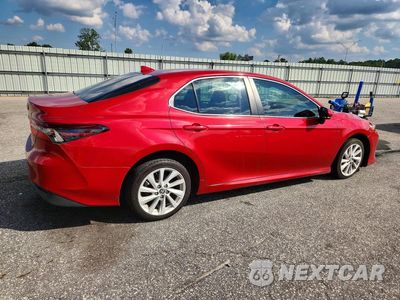 Trzecie zdjęcie samochodu z tyłu: 2023 TOYOTA CAMRY LE VIN:4T1C11AK9PU111788 - miniatura