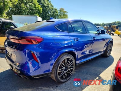 Trzecie zdjęcie samochodu z tyłu: 2020 BMW X6 M VIN:5YMCY0C01L9B05643 - miniatura