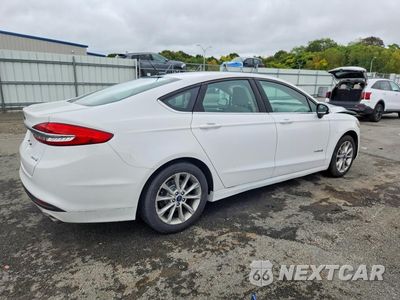 Trzecie zdjęcie samochodu z tyłu: 2017 FORD FUSION S HYBRID VIN:3FA6P0UU6HR236379 - miniatura