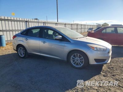 Czwarte zdjęcie samochodu z boku: 2017 FORD FOCUS SE VIN:1FADP3F27HL296433 - miniatura