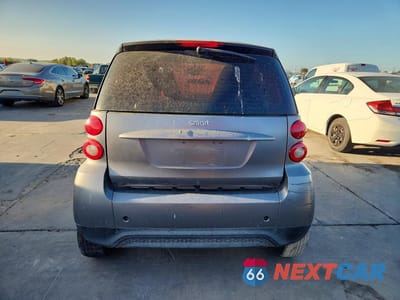 Zdjęcie 6 z 12 samochodu: 2013 SMART FORTWO PURE VIN:WMEEJ3BA1DK687771 - miniatura