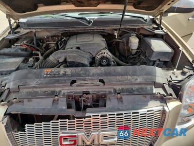 Zdjęcie 12 z 13 samochodu: 2012 GMC YUKON SLT VIN:1GKS1CE05CR108246 - miniatura