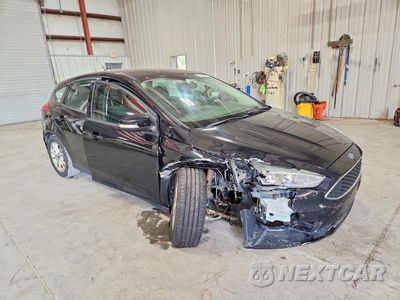 Czwarte zdjęcie samochodu z boku: 2017 FORD FOCUS SE VIN:1FADP3K29HL246462 - miniatura