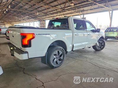 Trzecie zdjęcie samochodu z tyłu: 2023 FORD F150 LIGHTNING PRO VIN:1FT6W1EV2PWG56663 - miniatura