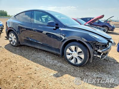 Czwarte zdjęcie samochodu z boku: 2023 TESLA MODEL Y VIN:7SAYGDEE7PA186030 - miniatura