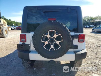 Zdjęcie 6 z 12 samochodu: 2014 JEEP WRANGLER UNLIMITED SPORT VIN:1C4BJWDG5EL251067 - miniatura