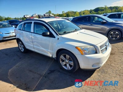 Czwarte zdjęcie samochodu z boku: 2010 DODGE CALIBER MAINSTREET VIN:1B3CB3HAXAD573943 - miniatura