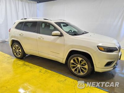 Czwarte zdjęcie samochodu z boku: 2019 JEEP CHEROKEE OVERLAND VIN:1C4PJMJN9KD173816 - miniatura