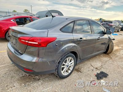 Trzecie zdjęcie samochodu z tyłu: 2016 FORD FOCUS SE VIN:1FADP3F21GL361243 - miniatura