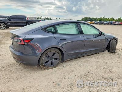 Trzecie zdjęcie samochodu z tyłu: 2023 TESLA MODEL 3 VIN:5YJ3E1EA4PF644554 - miniatura