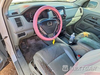 Zdjęcie 8 z 12 samochodu: 2005 HONDA PILOT EXL VIN:2HKYF18595H521705 - miniatura