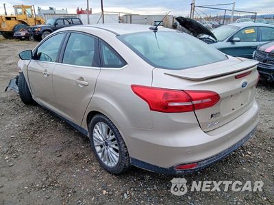 Drugie zdjęcie samochodu z przodu: 2017 FORD FOCUS TITANIUM VIN:1FADP3J29HL264767 - miniatura