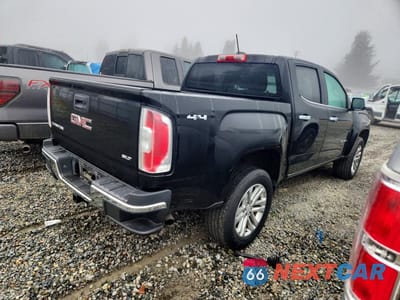 Trzecie zdjęcie samochodu z tyłu: 2015 GMC CANYON SLT VIN:1GTG6CE35F1209304 - miniatura
