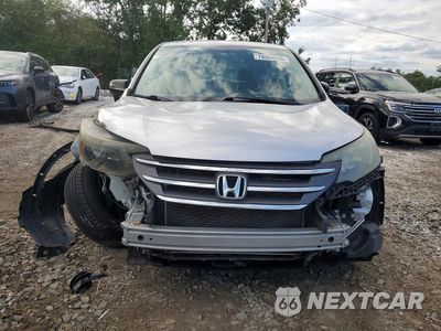 Piąte zdjęcie samochodu w środku: 2014 HONDA CR-V LX VIN:2HKRM4H3XEH721437 - miniatura