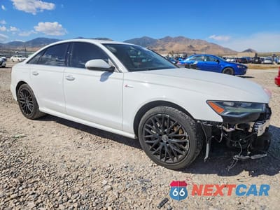 Czwarte zdjęcie samochodu z boku: 2016 AUDI A6 PRESTIGE VIN:WAUHGAFC5GN112714 - miniatura