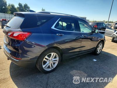 Trzecie zdjęcie samochodu z tyłu: 2018 CHEVROLET EQUINOX PREMIER VIN:3GNAXMEV5JS510325 - miniatura