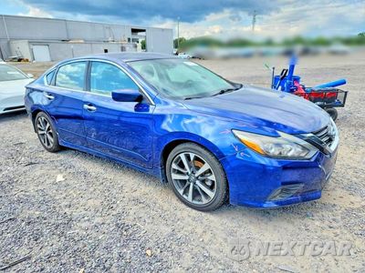 Czwarte zdjęcie samochodu z boku: 2016 NISSAN ALTIMA 2.5 SR VIN:1N4AL3AP8GC223488 - miniatura