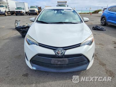 Piąte zdjęcie samochodu w środku: 2017 TOYOTA COROLLA L VIN:5YFBURHE8HP570170 - miniatura