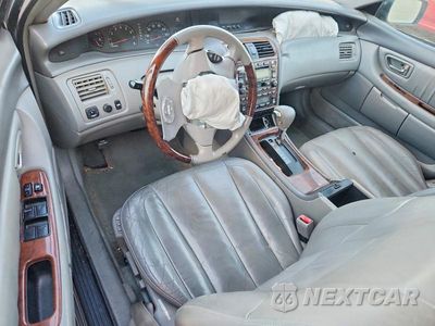 Zdjęcie 8 z 12 samochodu: 2003 TOYOTA AVALON XLS VIN:4T1BF28B33U338672 - miniatura