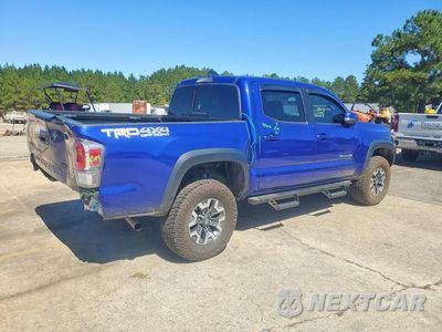 Trzecie zdjęcie samochodu z tyłu: 2023 TOYOTA TACOMA TRD OFF-ROAD VIN:3TMCZ5AN3PM571080 - miniatura