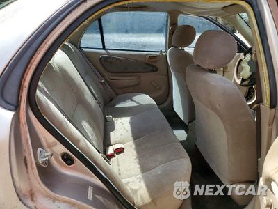 Zdjęcie 10 z 13 samochodu: 2001 TOYOTA COROLLA CE VIN:1NXBR12E21Z544826 - miniatura