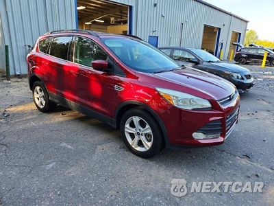 Czwarte zdjęcie samochodu z boku: 2014 FORD ESCAPE SE VIN:1FMCU9G99EUB63249 - miniatura
