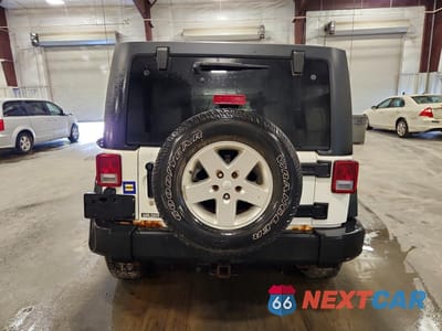 Zdjęcie 6 z 13 samochodu: 2013 JEEP WRANGLER UNLIMITED SPORT VIN:1C4BJWDG4DL542187 - miniatura