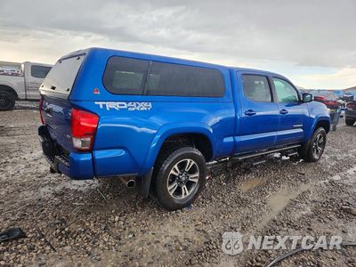 Trzecie zdjęcie samochodu z tyłu: 2016 TOYOTA TACOMA TRD SPORT VIN:3TMDZ5BN1GM008192 - miniatura