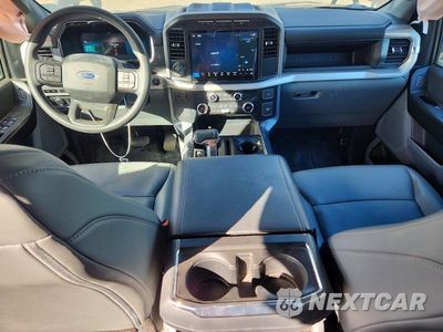 Zdjęcie 8 z 12 samochodu: 2023 FORD F150 LIGHTNING PRO VIN:1FTVW1EL6PWG01529 - miniatura