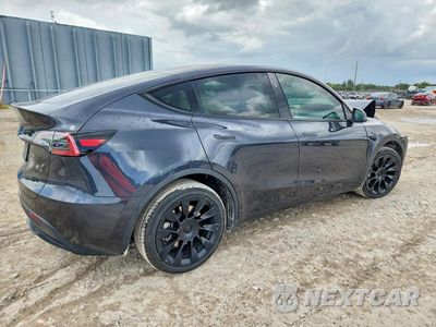 Trzecie zdjęcie samochodu z tyłu: 2024 TESLA MODEL Y VIN:7SAYGDEE5RA218511 - miniatura