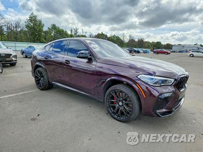 Czwarte zdjęcie samochodu z boku: 2021 BMW X6 M VIN:5YMCY0C04M9H14565 - miniatura