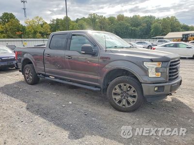 Czwarte zdjęcie samochodu z boku: 2015 FORD F150 SUPERCREW VIN:1FTFW1EF5FFC05332 - miniatura