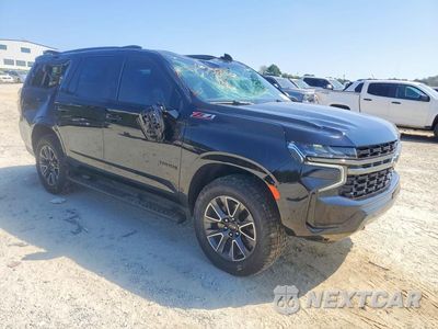 Czwarte zdjęcie samochodu z boku: 2021 CHEVROLET TAHOE K1500 Z71 VIN:1GNSKPKD7MR126991 - miniatura