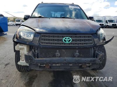 Piąte zdjęcie samochodu w środku: 2003 TOYOTA RAV4 BASE VIN:JTEGH20V730092920 - miniatura