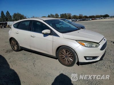 Czwarte zdjęcie samochodu z boku: 2015 FORD FOCUS TITANIUM VIN:1FADP3N21FL241667 - miniatura