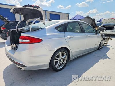 Trzecie zdjęcie samochodu z tyłu: 2018 FORD FUSION S HYBRID VIN:3FA6P0UU5JR254569 - miniatura