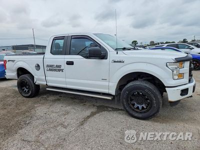 Czwarte zdjęcie samochodu z boku: 2015 FORD F150 SUPER CAB VIN:1FTEX1EP2FFD07172 - miniatura