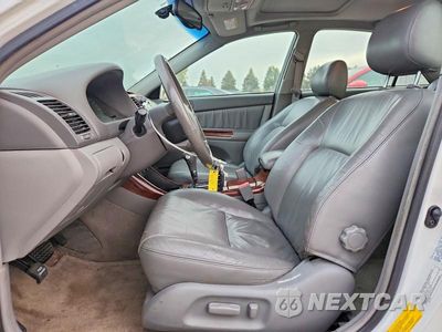 Zdjęcie 7 z 13 samochodu: 2003 TOYOTA CAMRY XLE VIN:4T1BE30KX3U256202 - miniatura