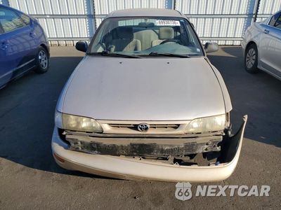 Piąte zdjęcie samochodu w środku: 1997 TOYOTA COROLLA BASE VIN:1NXBA02E4VZ520986 - miniatura