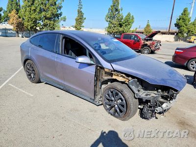 Czwarte zdjęcie samochodu z boku: 2023 TESLA MODEL X VIN:7SAXCDE51PF415747 - miniatura