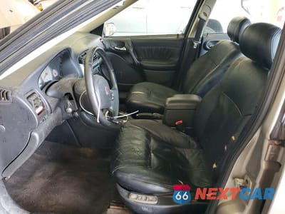 Zdjęcie 7 z 12 samochodu: 2003 SATURN L300 VIN:1G8JW54R83Y523274 - miniatura