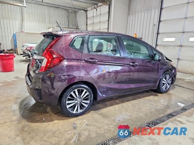 Trzecie zdjęcie samochodu z tyłu: 2017 HONDA FIT EX VIN:3HGGK5H88HM702688 - miniatura