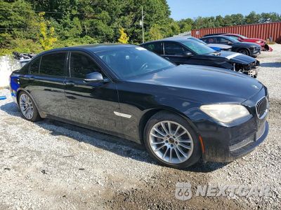 Czwarte zdjęcie samochodu z boku: 2014 BMW 750 LXI VIN:WBAYF8C58ED141757 - miniatura
