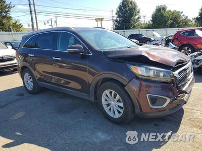 Czwarte zdjęcie samochodu z boku: 2016 KIA SORENTO LX VIN:5XYPG4A3XGG023199 - miniatura