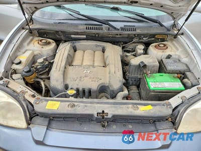 Zdjęcie 12 z 13 samochodu: 2005 HYUNDAI SANTA FE GLS VIN:KM8SC73DX5U003779 - miniatura