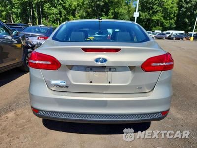 Zdjęcie 6 z 12 samochodu: 2016 FORD FOCUS SE VIN:1FADP3F20GL308615 - miniatura