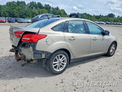 Trzecie zdjęcie samochodu z tyłu: 2016 FORD FOCUS SE VIN:1FADP3F25GL239985 - miniatura